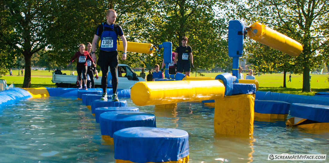 Rough Runner 2015 at Clapham Common with swinging rotating obstacles
